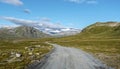 Veodalsvegen ground road in the direction of Jotunheimen mountain area, Glittertind mountain is visible in center. Norway