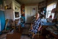 Vepsian local woman in them rural home.