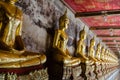 Veranda of Gild Buddha Sculptures at Wat Suthat, Bangkok of Thailand.