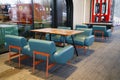 The veranda of a Moscow restaurant in the Gorky Park of Culture. Leather sofas and tables in the style of the sixties. Vintage