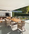 Veranda, wooden table and wicker chairs