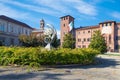 Vercelli city, Italy. Castle in the city center with flowers in the foreground