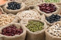 Vereous multicolor dried legumes in sack cloth