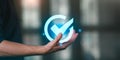 Verification and approval concept in digital business. Hand with glowing check mark icon represents trust, validation, completed Royalty Free Stock Photo