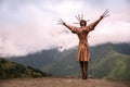 VERKHNIY ZGID, RUSSIA - 07 25 2021: Newly built Dance With Daggers monument towering along with high mountain peaks in