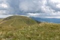 Verkhovyna Watershed Range, Pikui Mountain. Carpathian mountains with grassy slopes and rocks on Pikuy mount. Beautiful mountain l