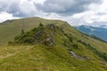 Verkhovyna Watershed Range, Pikui Mountain. Carpathian mountains with grassy slopes and rocks on Pikuy mount. Beautiful mountain l
