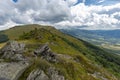 Verkhovyna Watershed Range, Pikui Mountain. Carpathian mountains with grassy slopes and rocks on Pikuy mount. Beautiful mountain l