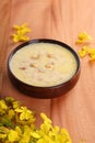 Vermecelli Payasam or Kheer with glden shower flower Royalty Free Stock Photo