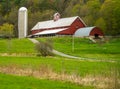 Vermont Farm Scene with red barn silo fields horse Royalty Free Stock Photo