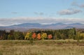 Vermont field in the fall with mountains Royalty Free Stock Photo