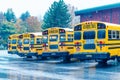 VERMONT, US - OCTOBER 9, 2015: Row of school buses during foliage season Royalty Free Stock Photo