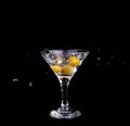 Vermouth cocktail inside martini glass over dark background Royalty Free Stock Photo