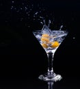 Vermouth cocktail inside martini glass over dark background Royalty Free Stock Photo