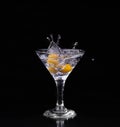 Vermouth cocktail inside martini glass over dark background Royalty Free Stock Photo