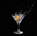 Vermouth cocktail inside martini glass over dark background Royalty Free Stock Photo