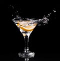 Vermouth cocktail inside martini glass over dark background Royalty Free Stock Photo