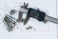 Vernier caliper and assorted screw, nuts and bolts
