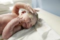 Vernix covered newborn after delivery Royalty Free Stock Photo