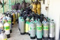 Scuba tanks at a dive shop waiting for customer`s use Royalty Free Stock Photo