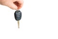 A dangling Toyota car key isolated on a white background. Royalty Free Stock Photo