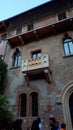 The famous House of Juliet with its balcony in a small courtyard in the city of Verona Italy is always full of tourists Royalty Free Stock Photo