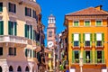 Verona colorful street and Lamberti tower view