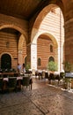 VERONA, ITALY - AUGUST 17, 2017: Restaurant under the arches of the inner courtyard of the castle. Royalty Free Stock Photo