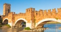 Verona, Italy. Castelvecchio bridge on Adige river. Old castle sightseeing at sunrise Royalty Free Stock Photo