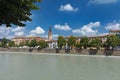 Verona, Italy, Europe, August 2019, A view of the River Adige and the Chiesa Parrocchiale di Santa Maria in Organo