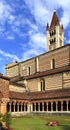 Verona, Italy - historic city center - external view of Basilica of Saint Zeno Maggiore with church tower, inner churchyard and Royalty Free Stock Photo