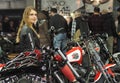 Verona, Italy - january 20, 2018: motor bike expo, girl posing on Harley Davindson