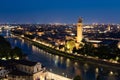 Verona, Italy - June 2022: panorama by night. Illuminated cityscape with scenic bridge