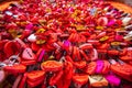 Verona, Italy - March 15, 2019: Juliet house, red locks with inscriptions and wishes on wall with chewing gum Royalty Free Stock Photo