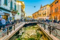 VERONA, ITALY, MARCH 19, 2016: people are strolling along uncovered roman ruins in the italian city verona...IMAGE