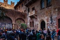 Verona, Italy Ã¢â¬â March 2019. Statue of Juliet in garden of Gothic-style 1300s house and museum, with a stone balcony, said to Royalty Free Stock Photo