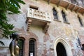 Balcony of Juliet and bronze statue of Juliet Capuleti of the house-museum of Juliet. Royalty Free Stock Photo