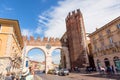 Verona, Italy - September, 2017: Medieval Porta Nuova, gate to the old town of Verona with tourists. Piazza Bra in Verona. Veneto