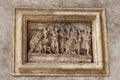 Stone bas-relief on the wall at the exposition in the courtyard of the Museo Lapidario Maffeiano in Verona, Italy