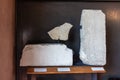 Stone fragments with engraved texts at an exhibition in the Museo Lapidario Maffeiano in Verona, Italy