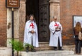 Two men dressed as Templar stand at the entrance to the church S. Pietro Martire in Verona, Italy