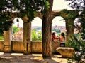 Verona Italy/21st June 2012/A female tourist chats to a friend w