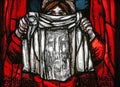 Veronica holding her veil, Dark sun of Good Friday, detail of stained glass window in St James church in Hohenberg, Germany