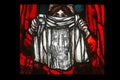 Veronica holding her veil, Dark sun of Good Friday, detail of stained glass window by in St. James church in Hohenberg, Germany