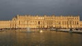 VERSAILLE FRANCE: Chateau de Versailles at sunset with pond and fountain, the estate of Versaille was the home and court of Loui