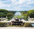 Versailles Castle gardens with fountain & tourists Royalty Free Stock Photo