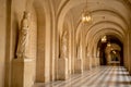 Versailles Exterior Hallway with statues Royalty Free Stock Photo