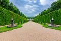 Versailles formal gardens in Paris suburbs at sunset, France Royalty Free Stock Photo