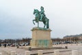 Versailles, France - 10.01.2019: Equestrian statue of Louis XIV on Place d`Armes in front of Palace of Versailles. Palace Royalty Free Stock Photo