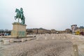 Versailles, France - 10.01.2019: Equestrian statue of Louis XIV on Place d`Armes in front of Palace of Versailles. Palace Royalty Free Stock Photo